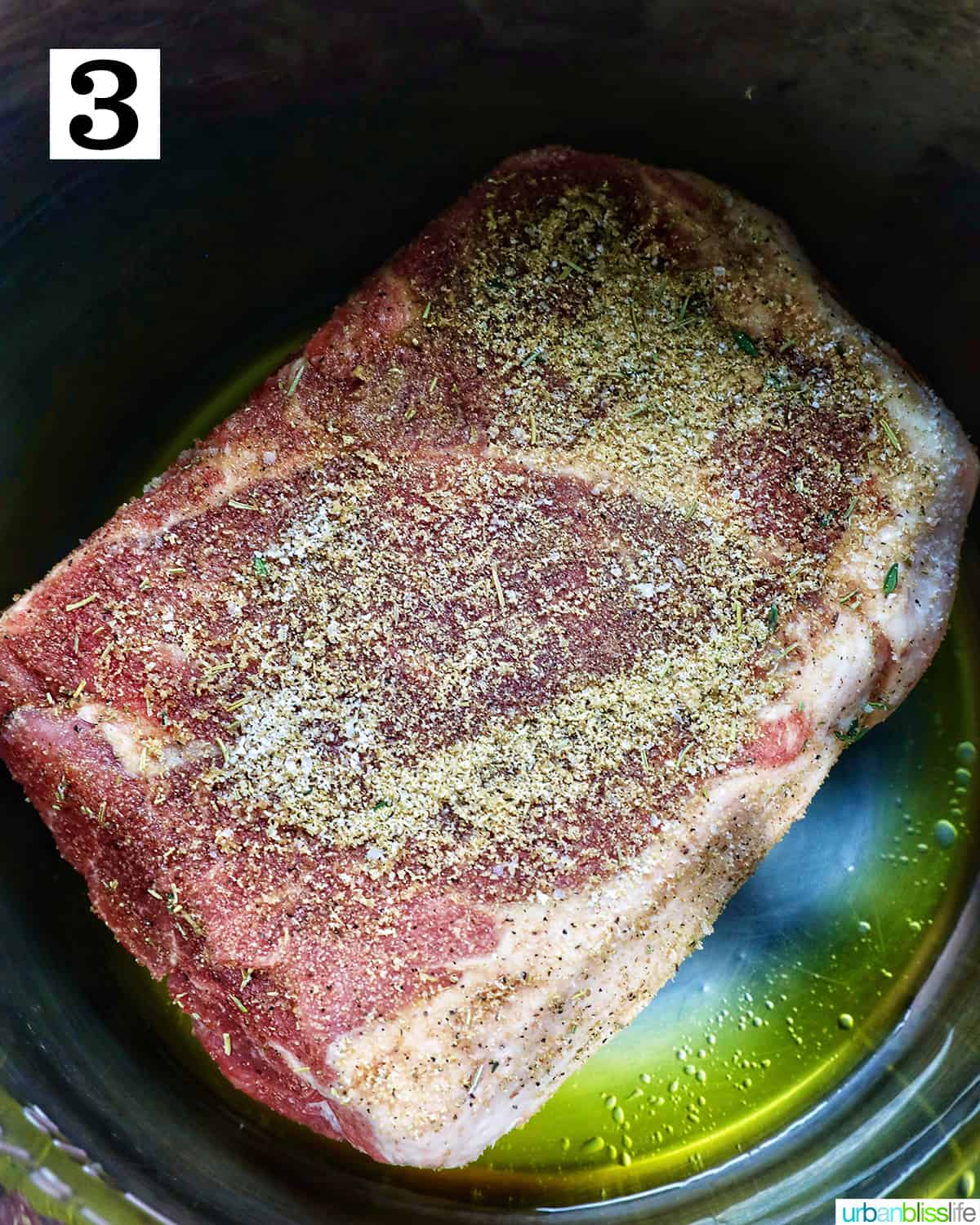 searing sides of seasoned pork roast in an Instant Pot with olive oil.
