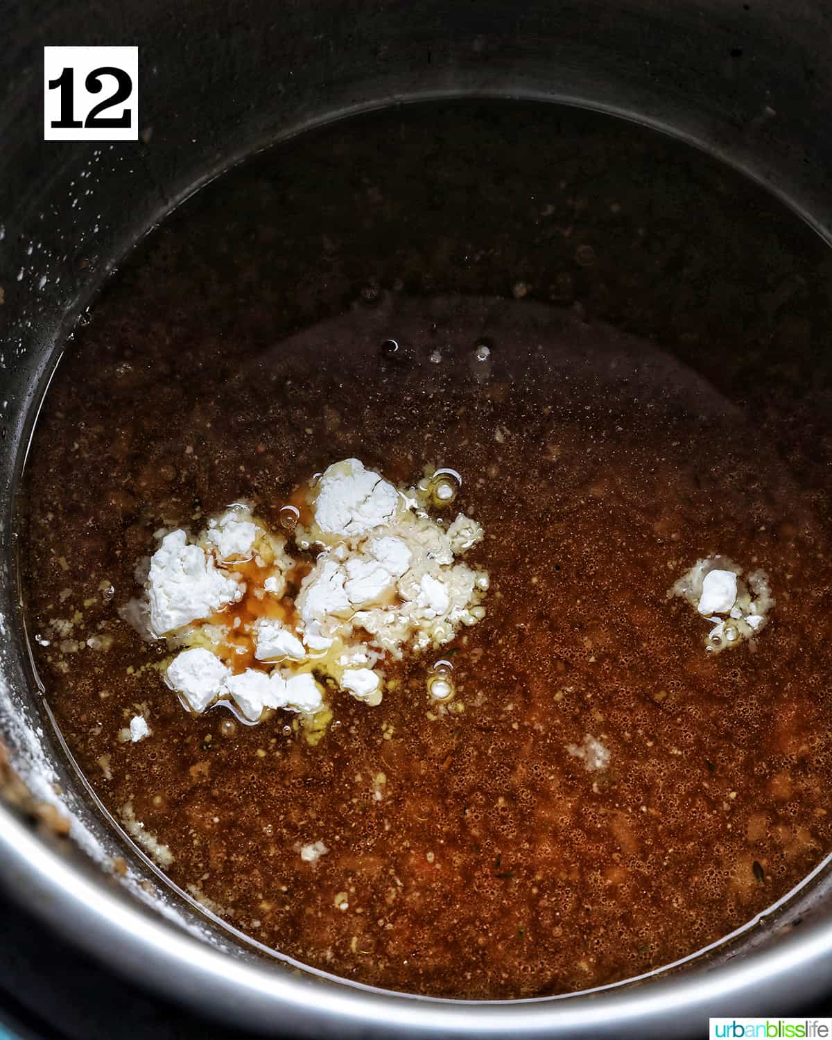 Adding cornstarch to the remaining liquid in the Instant Pot to make a gravy.