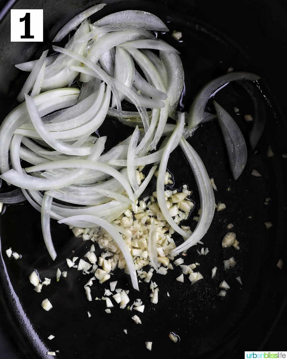 minced garlic and diced onions in a dutch oven.
