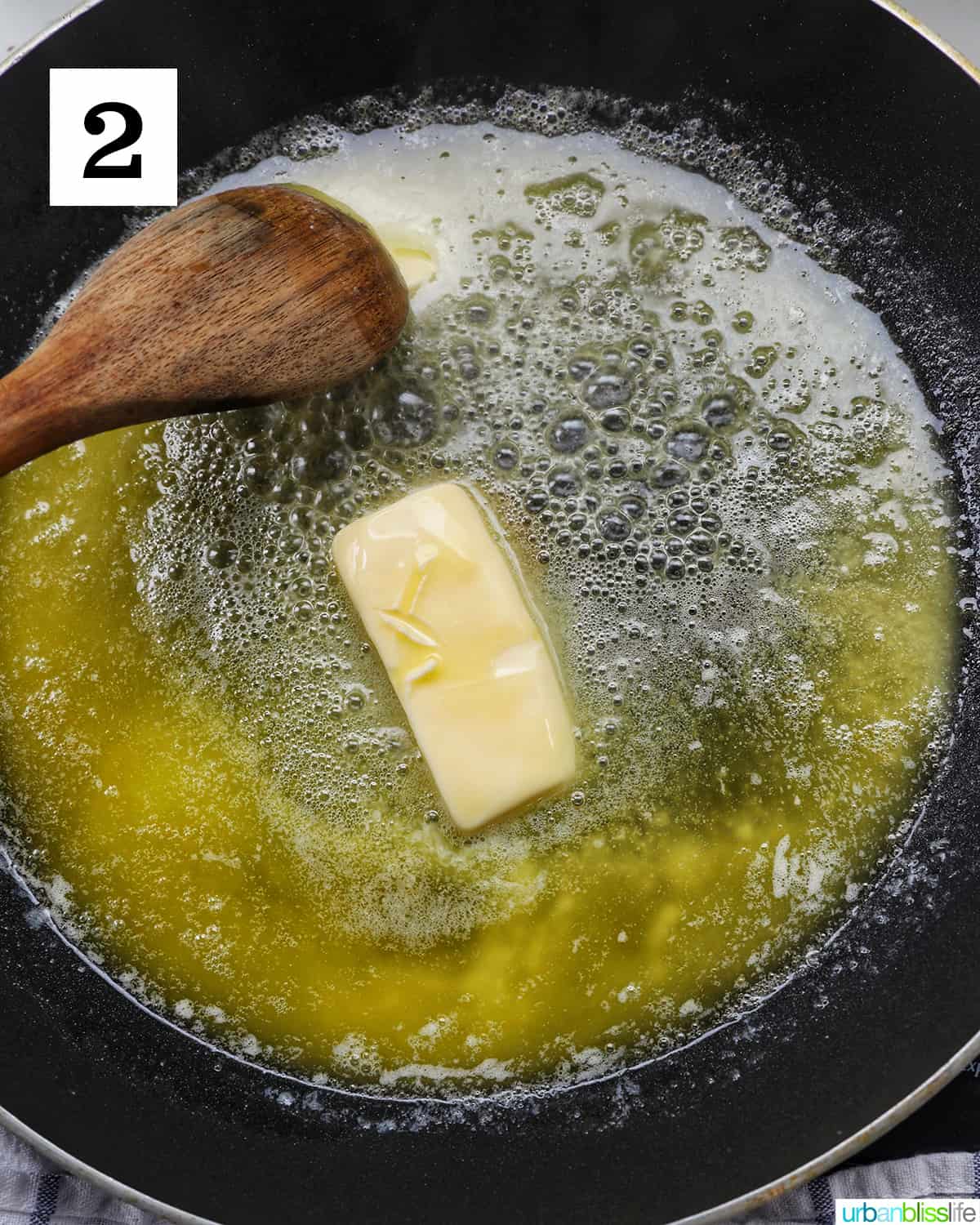 wooden spoon and melting butter in a nonstick skillet.