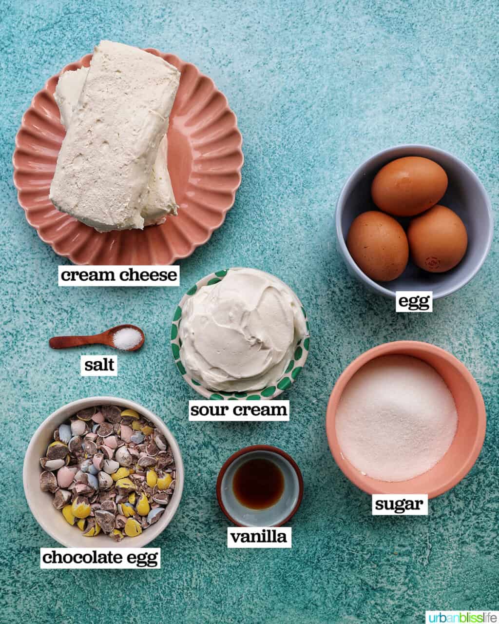 bowls of ingredients to make the cheesecake filling