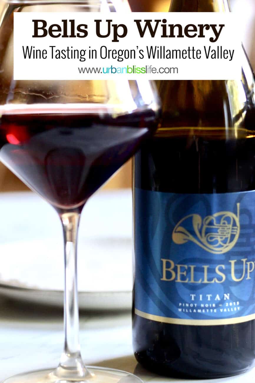 glass of red wine next to a bottle of Bells Up Winery pinot noir with title text that reads Bells Up Winery, Wine Tasting in Oregon's Willamette Valley.