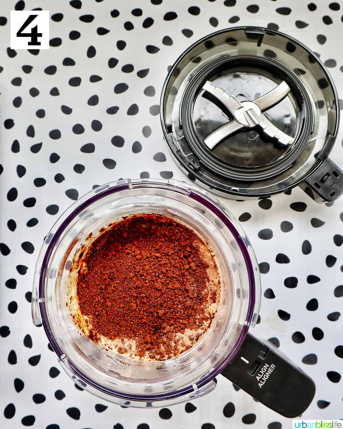 Ninja Creami container with vanilla ice cream, cocoa powder, and instant coffee.