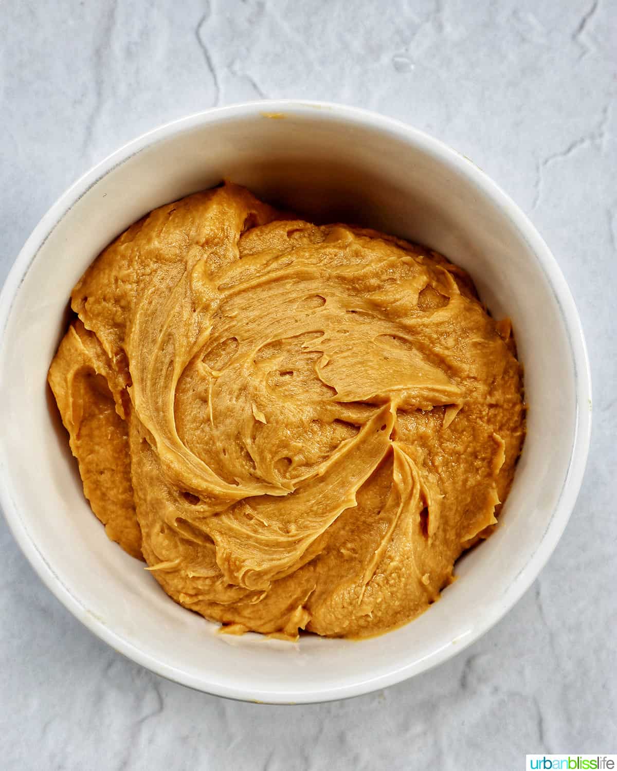white bowl with coffee buttercream.