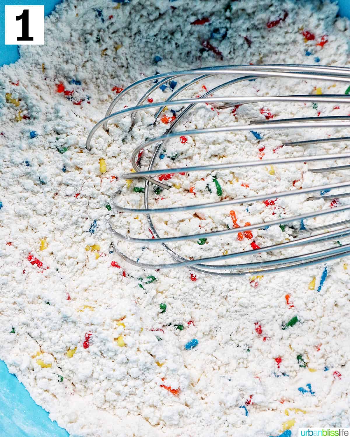 whisk in dry ingredients with sprinkles for funfetti pancakes.