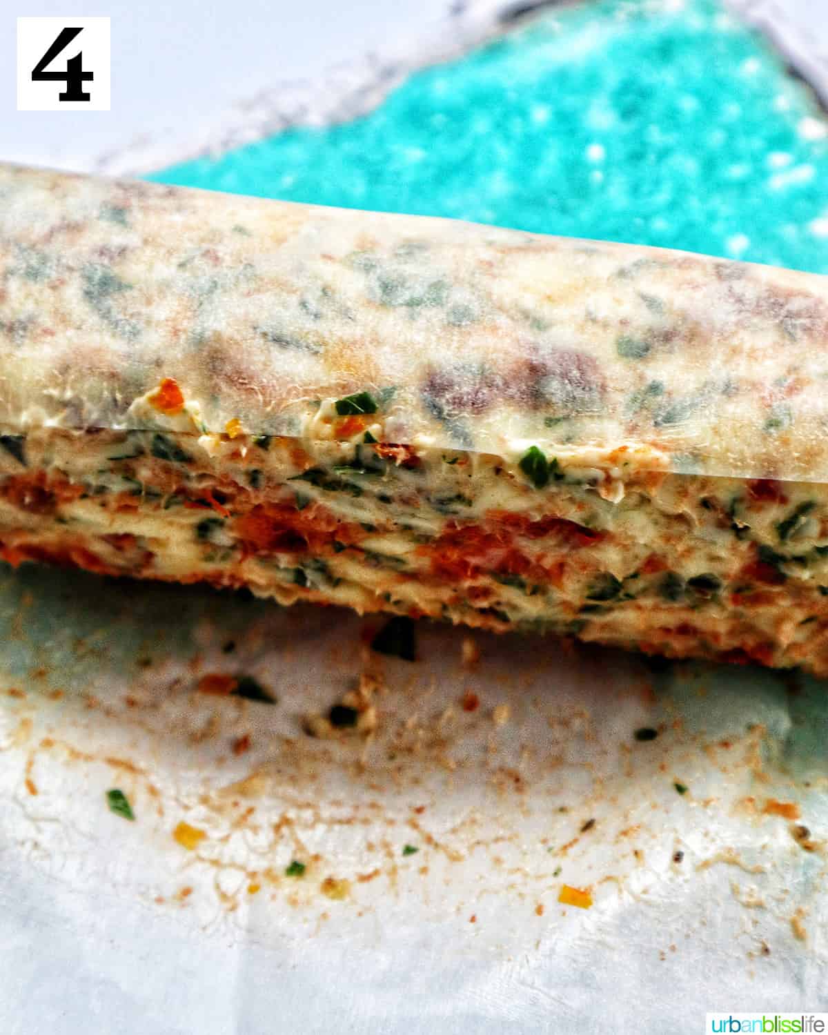 sun dried tomato butter wrapped in parchment paper.