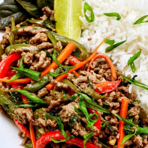 Thai basil beef with red peppers, green onions, and white rice.