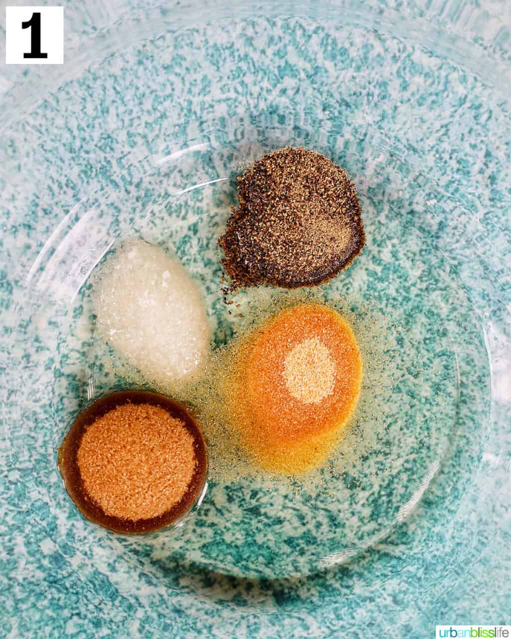 ingredients in a glass bowl to mix together to make the seasoning for air fryer lechon kawali.