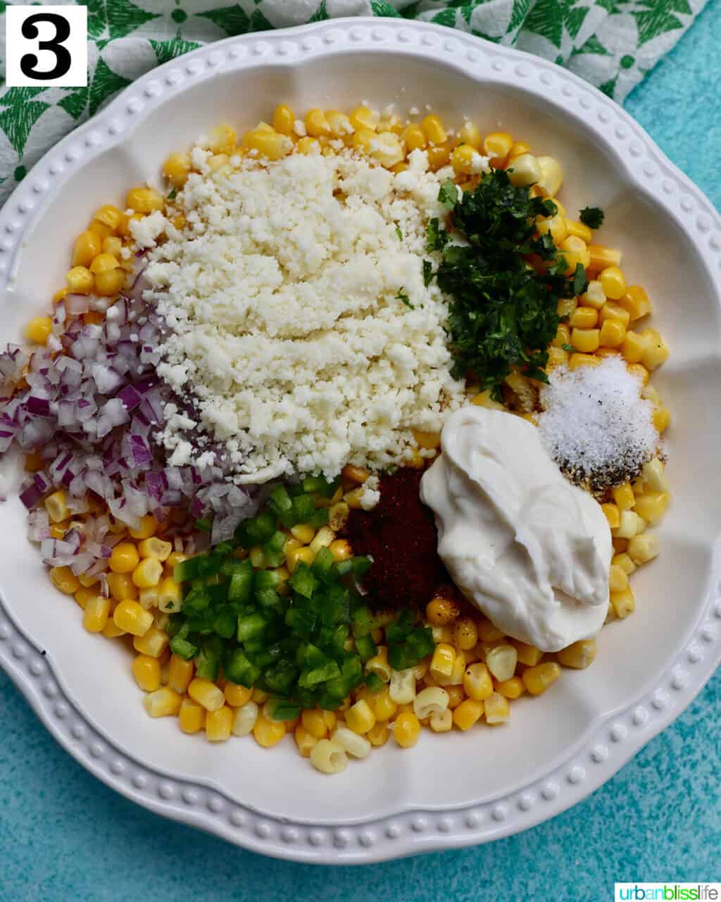 ingredients for elote dip in one big bowl.