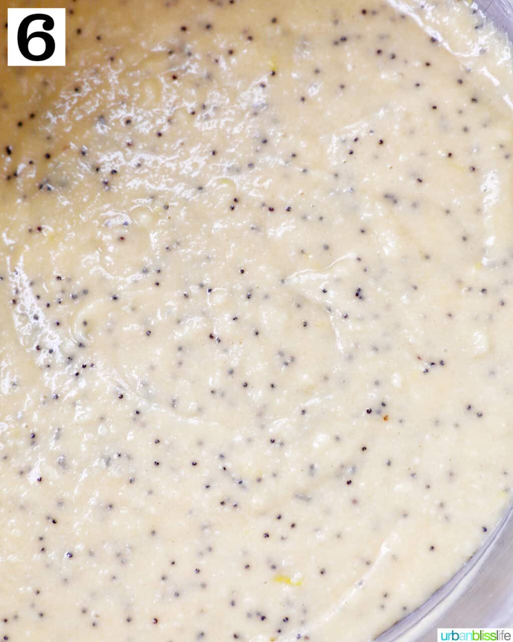 lemon poppyseed cupcake batter in a bowl.