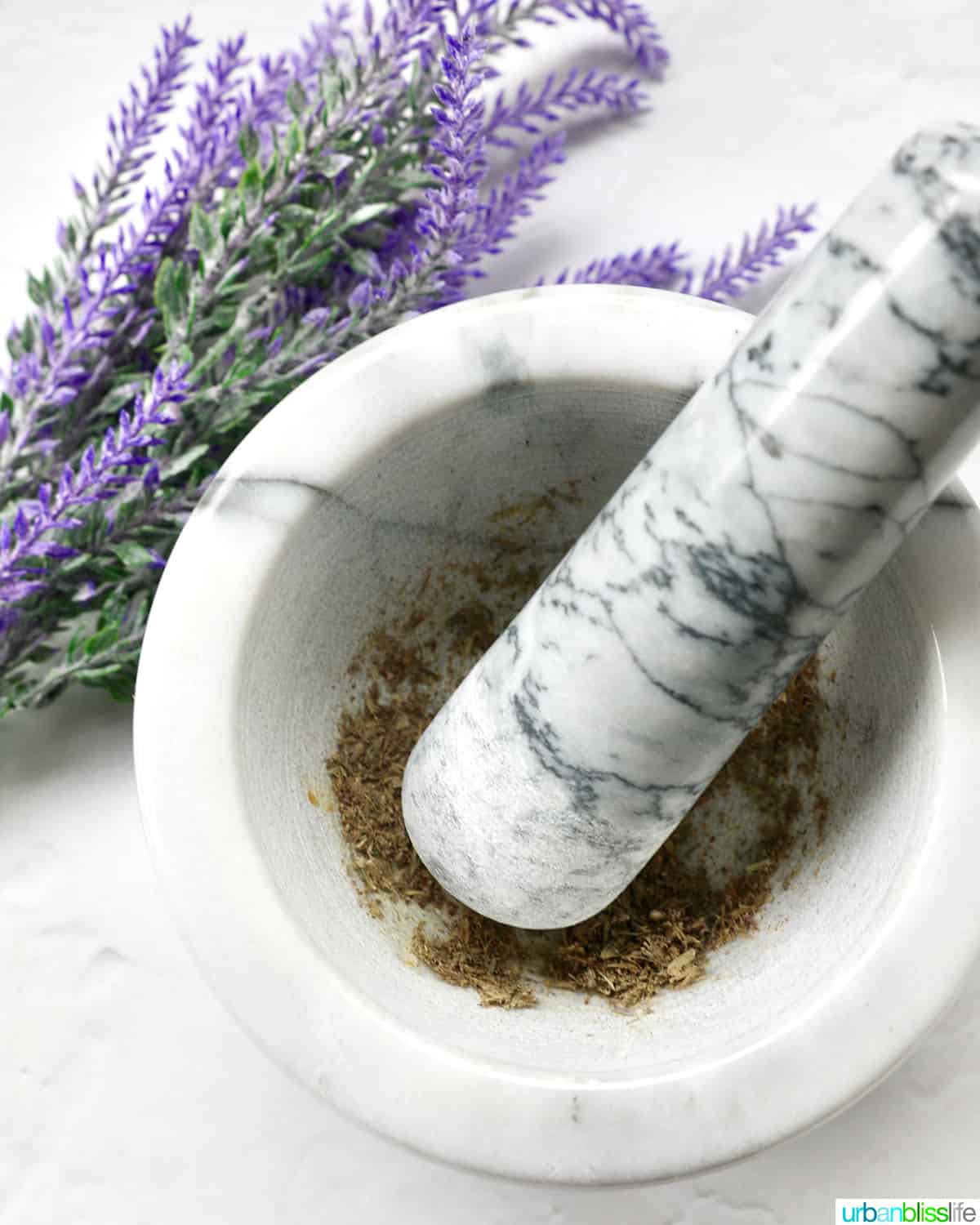 mortar and pestle grinding lavender