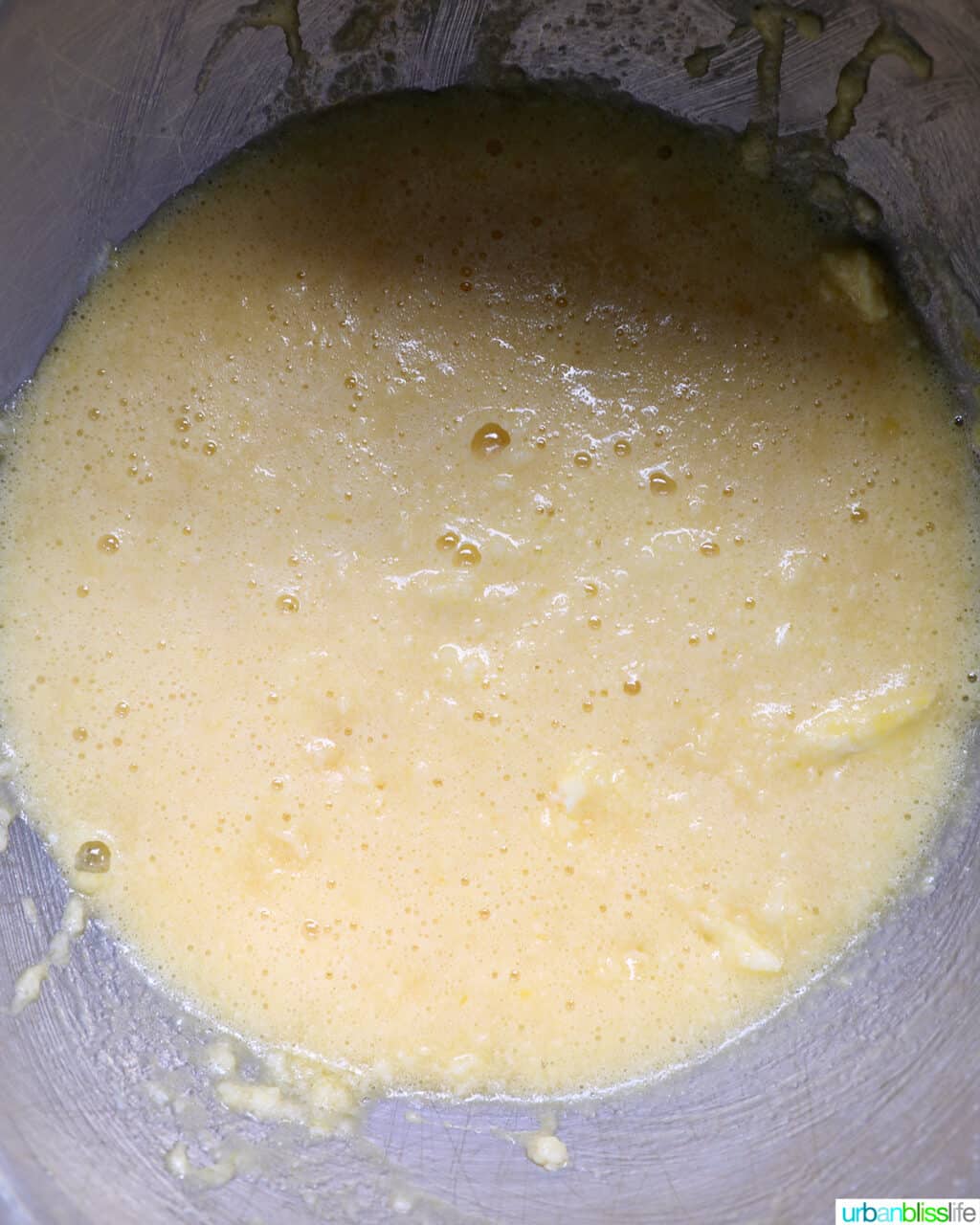 stainless steel bowl with cake batter.