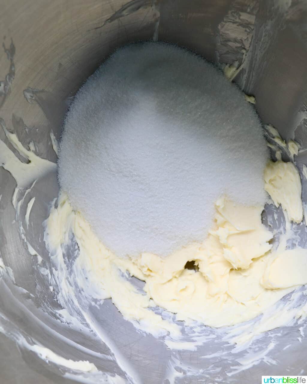 sugar and butter in a stainless steel bowl.