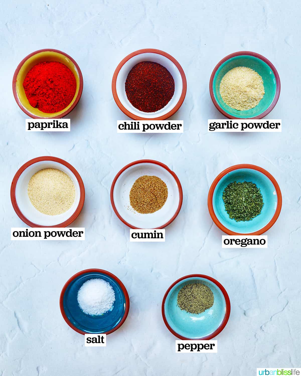 jars of ingredients to make homemade mild taco seasoning.