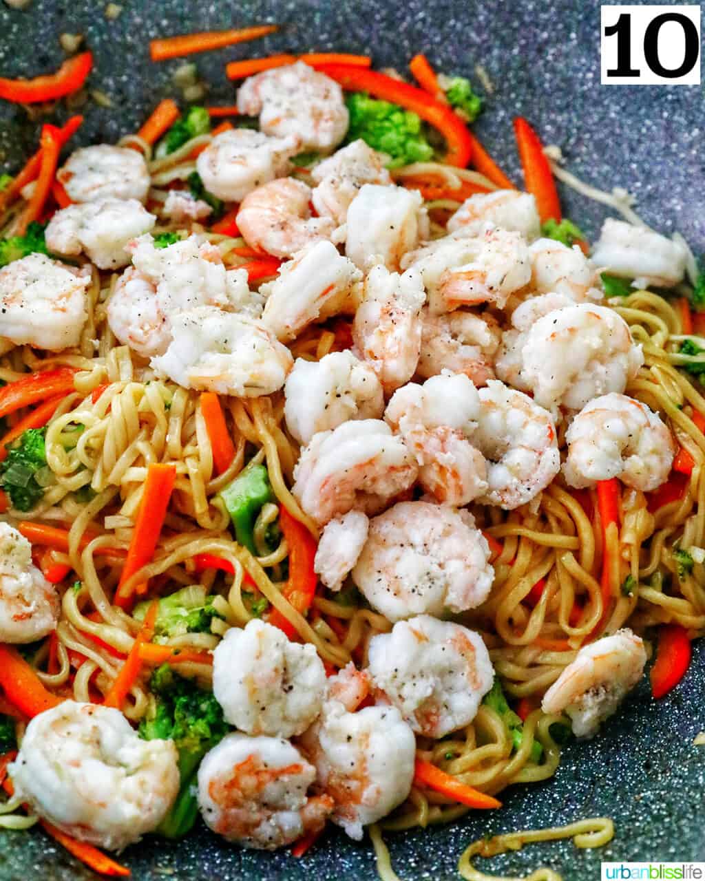 wok of prawn chow mein noodles.