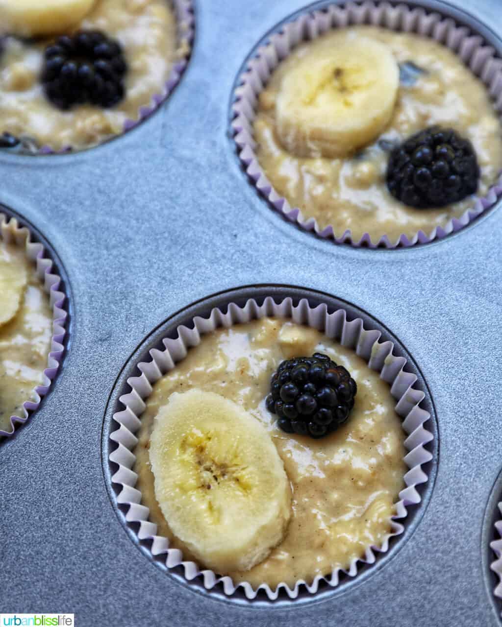 muffin batter in lined muffin cups.