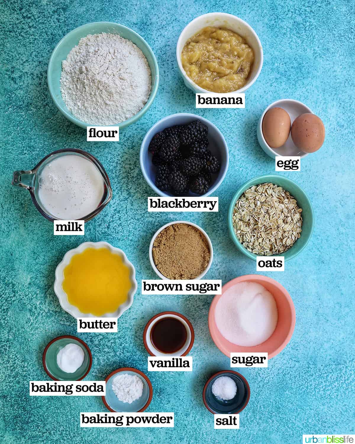 bowls of ingredients to make banana blackberry oatmeal muffins.