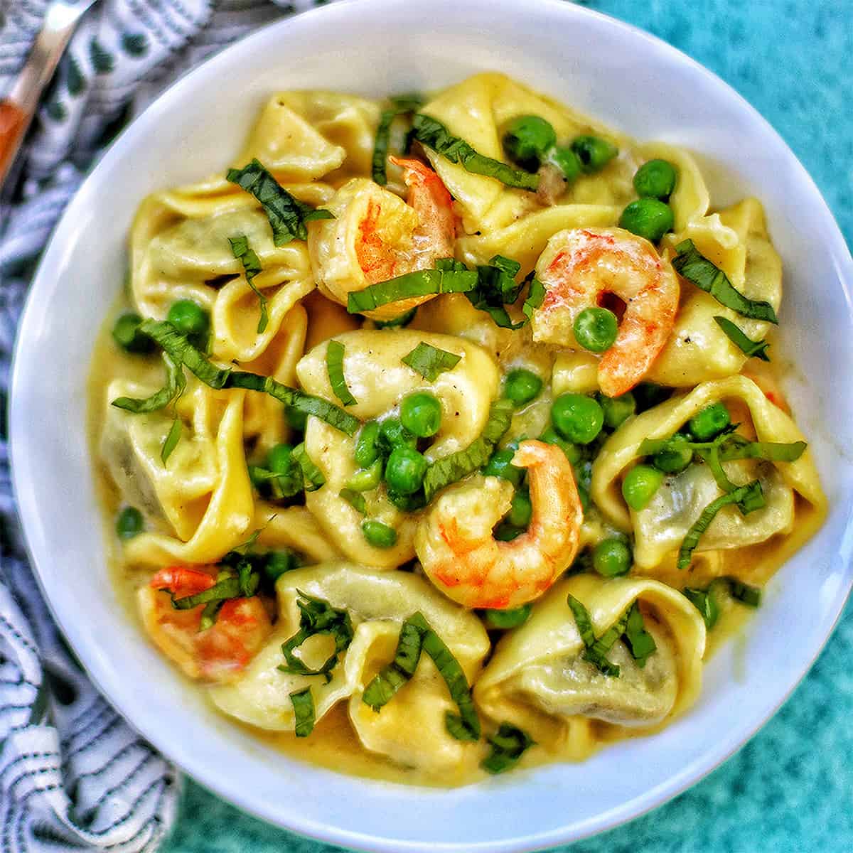 Dairy-Free Shrimp Tortellini with Peas in a bowl