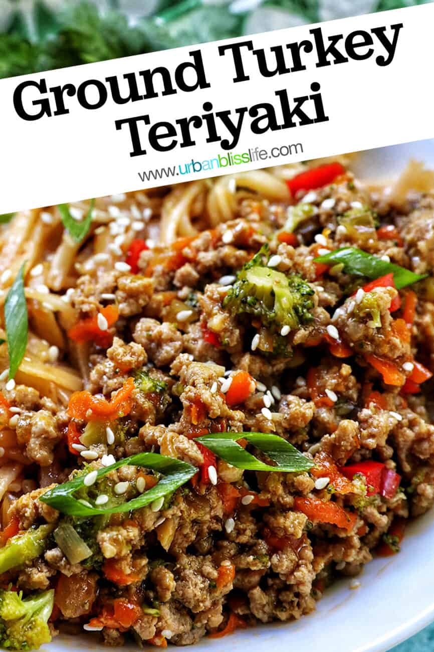 Ground Turkey Teriyaki with green onions, broccoli, carrots, and red bell peppers, in a white bowl with cilantro garnish with title text.