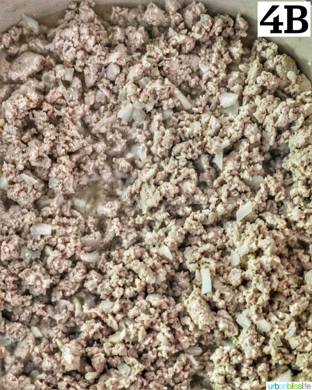 cooked ground turkey with onions and garlic in a skillet.