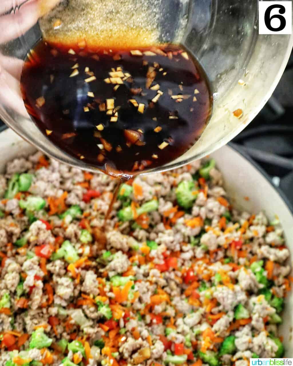 bowl of teriyaki sauce over ground beef teriyaki.