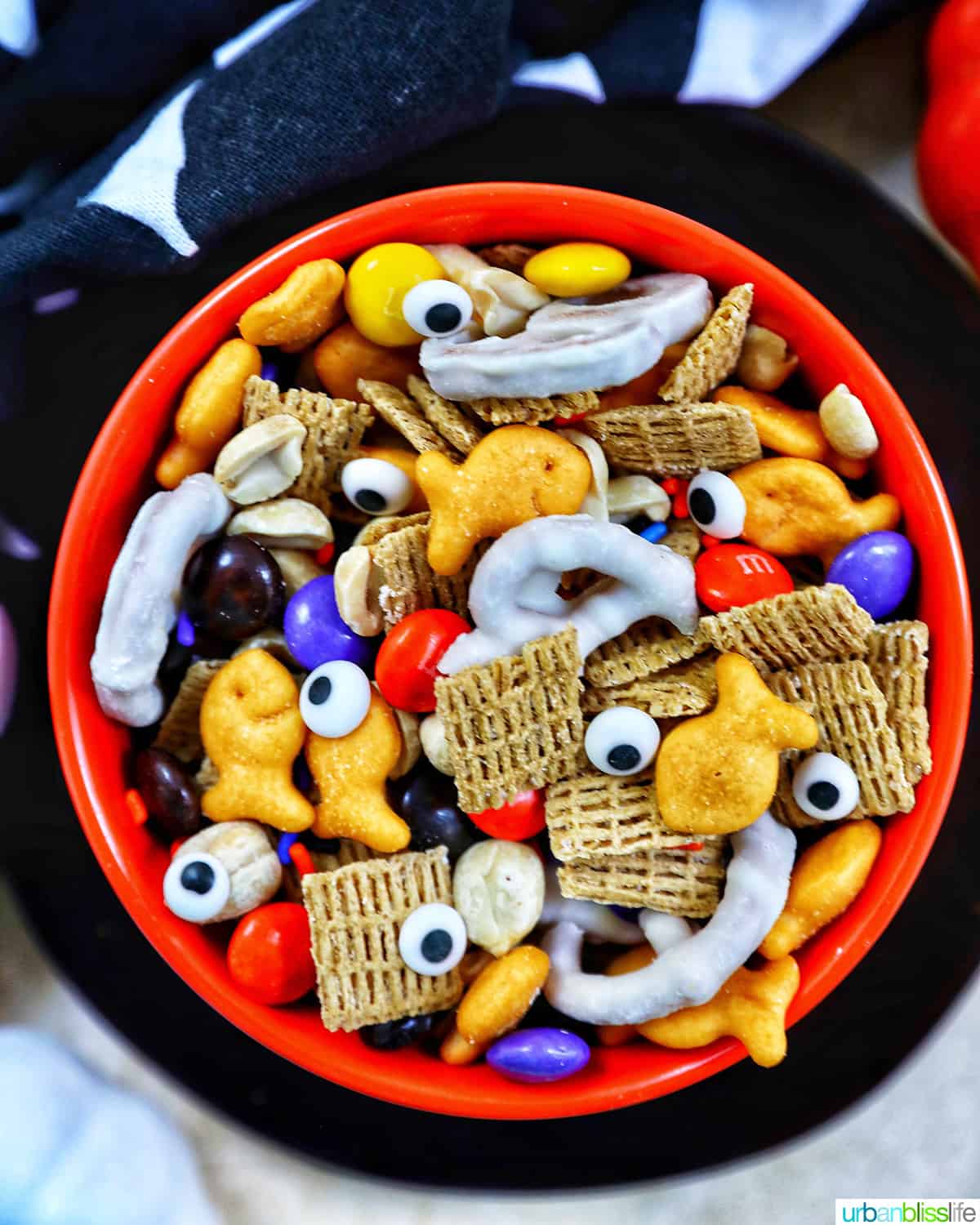 orange bowl with Halloween Snack Mix.