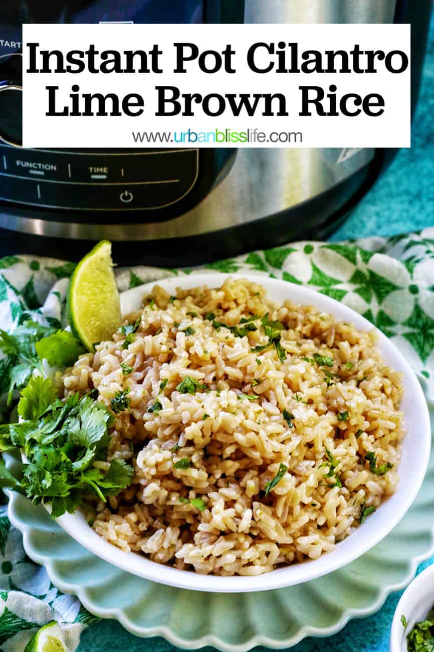 white bowl with Instant Pot Cilantro Lime Brown Rice on a green and white napkin with sides of cilantro leaves and lime wedges with title text.