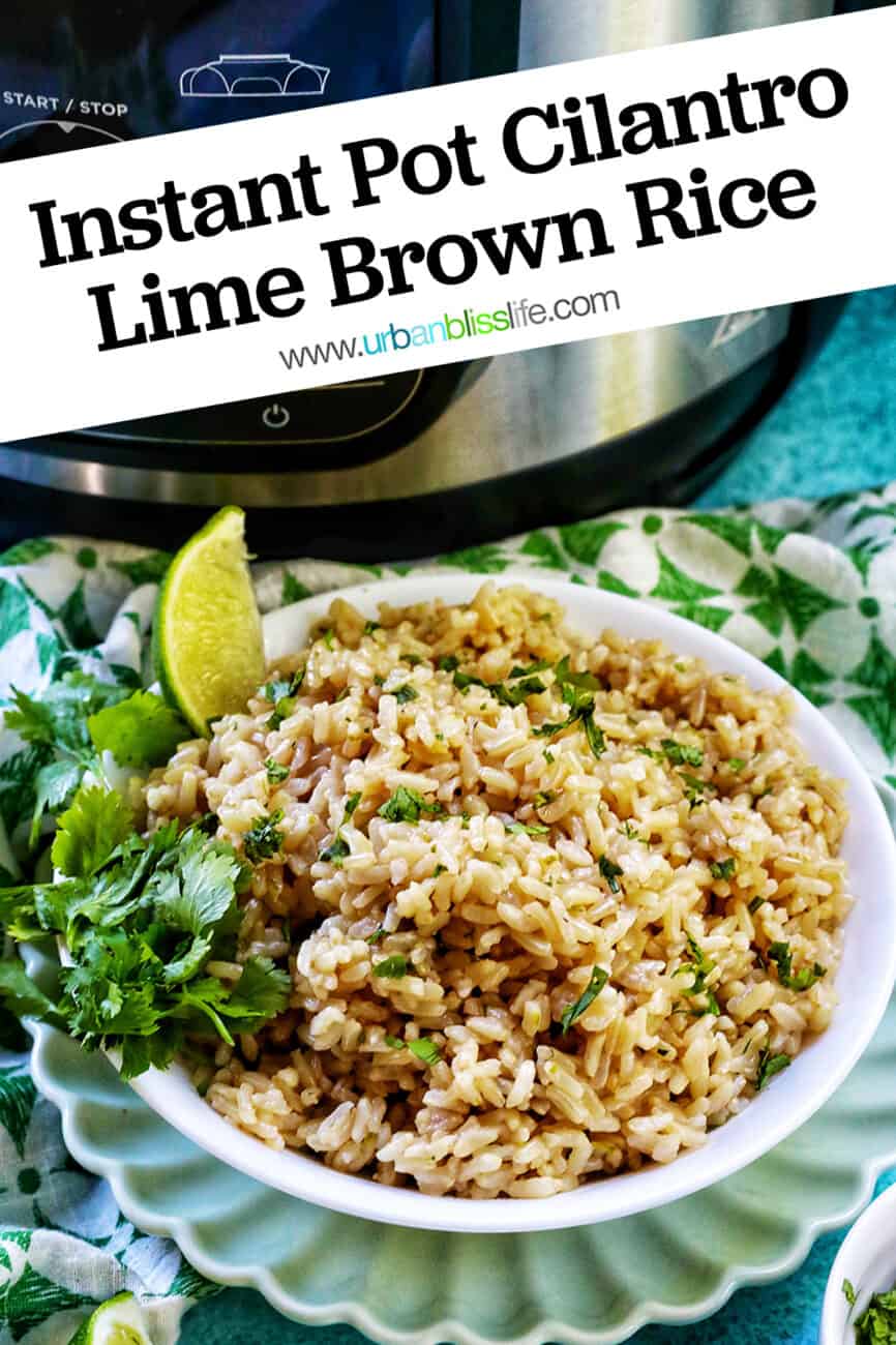 white bowl with Instant Pot Cilantro Lime Brown Rice on a green and white napkin with sides of cilantro leaves and lime wedges with title text.