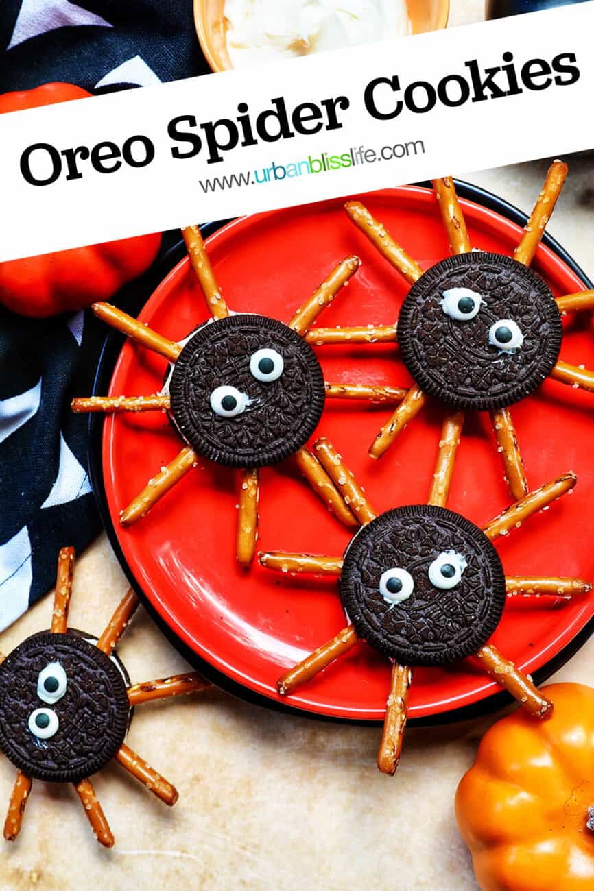 several Oreo Spider Cookies on an orange plate with Halloween decorations around it with title text that reads "Oreo Spider Cookies."