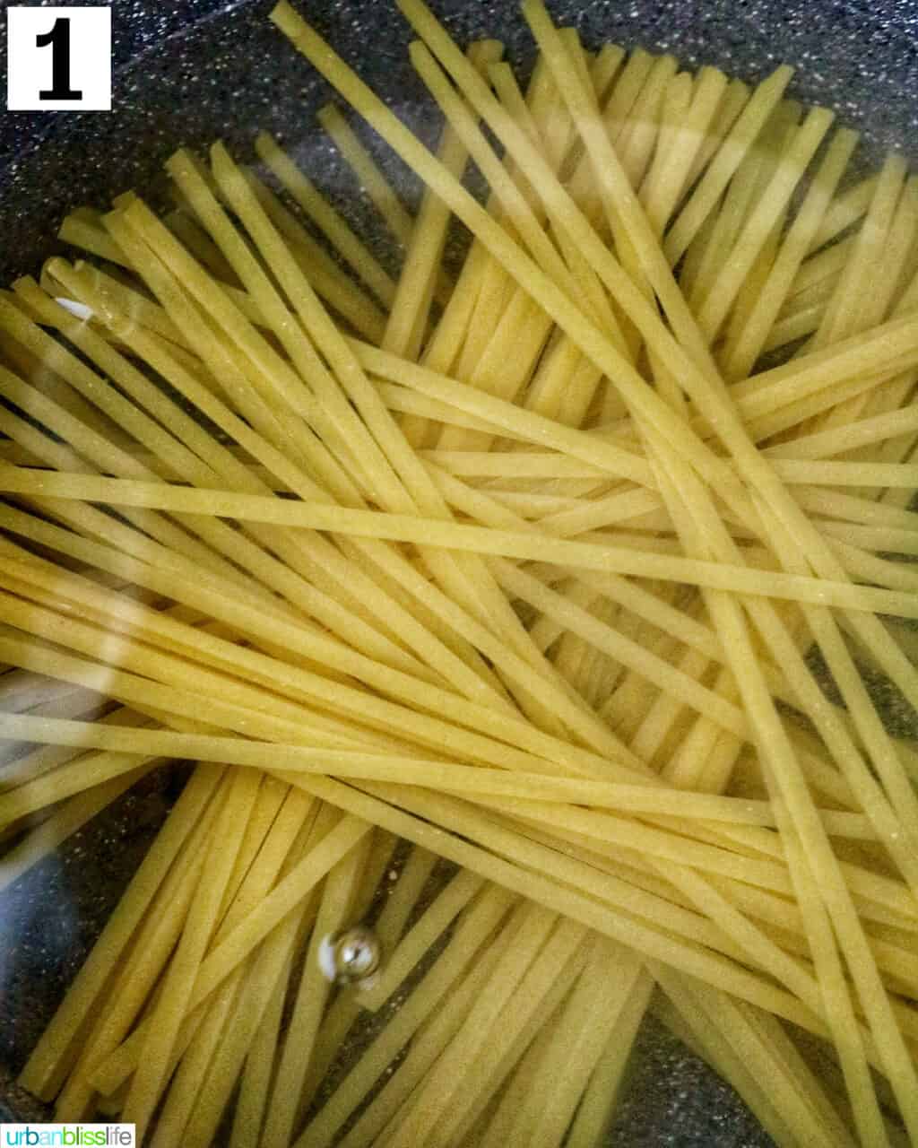 pasta in a large pot of water to cook.