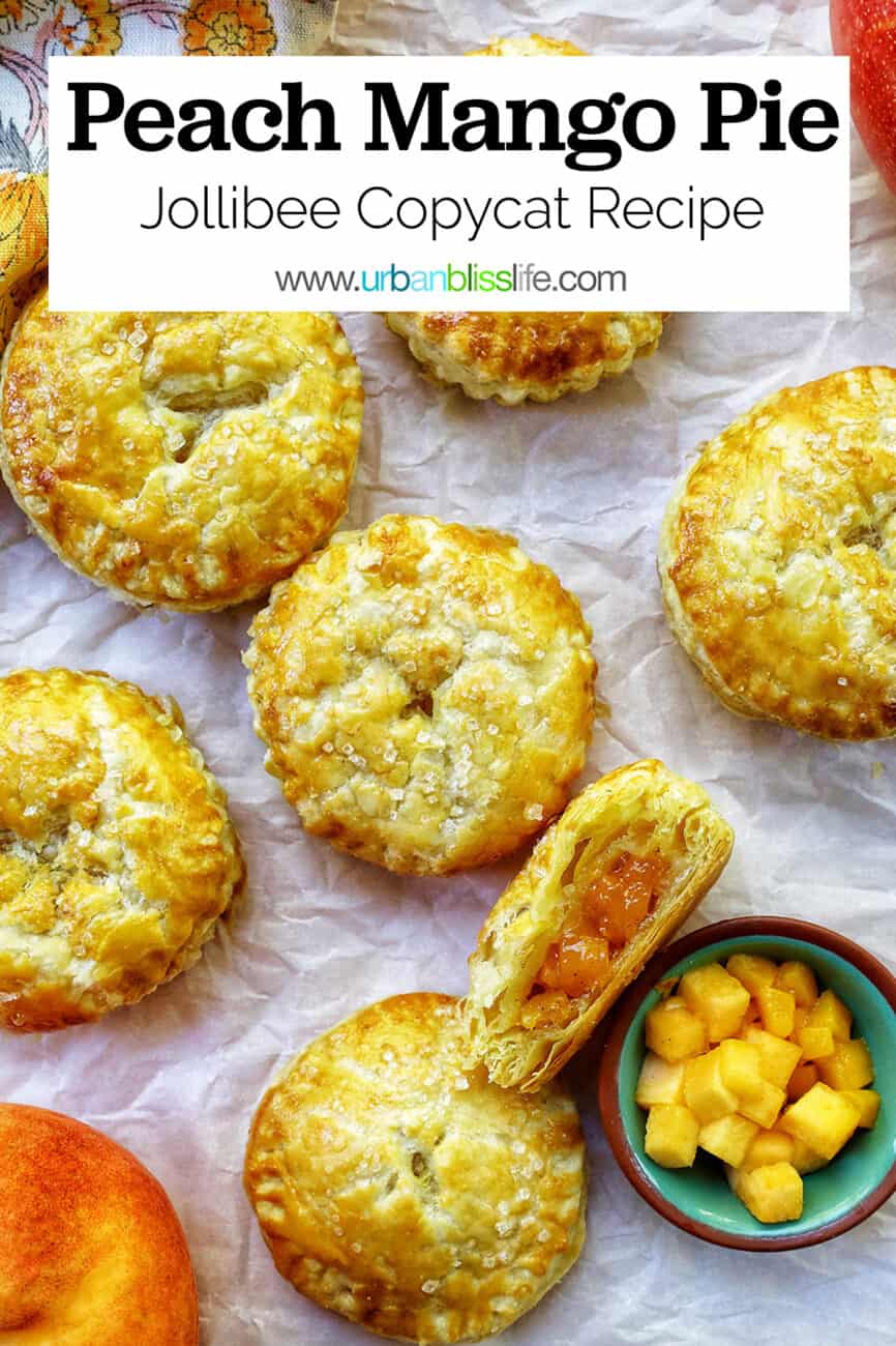 several mini peach mango hand pies on crinkled parchment paper with a bowl of diced peaches and mangoes with title text that reads "Peach Mango Pie Jollibee Copycat Recipe."