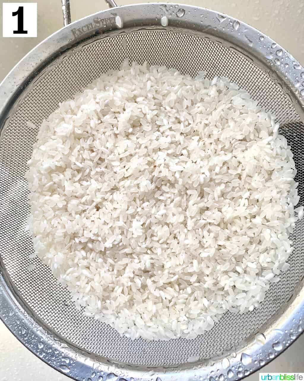 rinsing rice over a strainer.