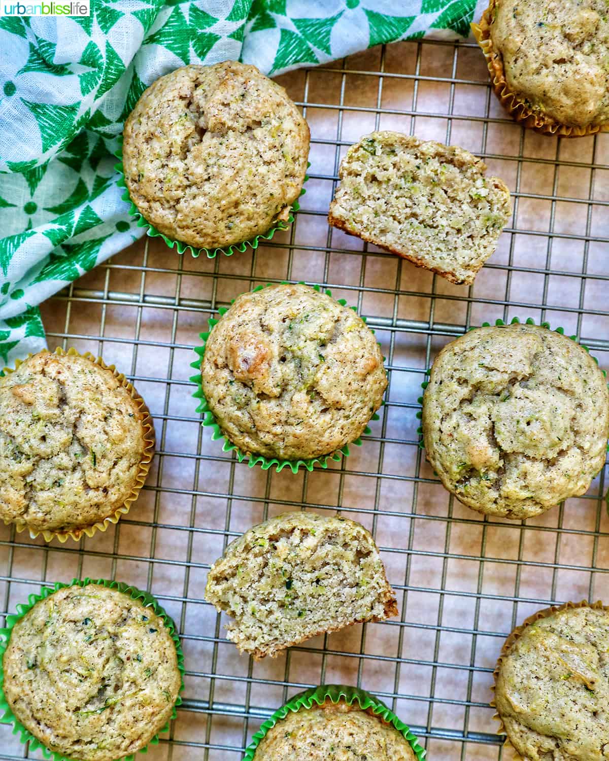 vegan zucchini muffins on a wire rack.