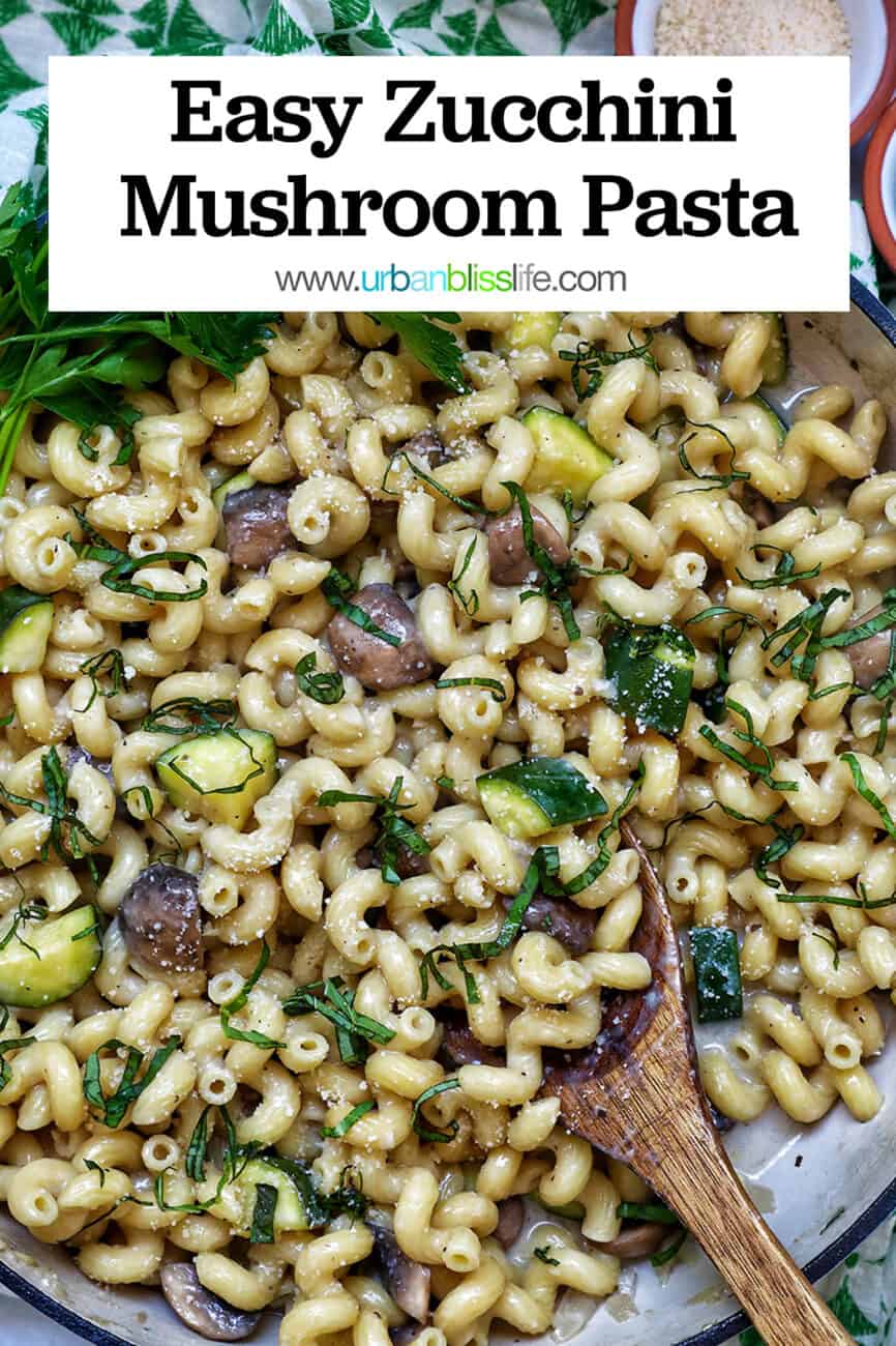 zucchini mushroom pasta in a large saucepan with title text that reads "Zucchini Mushroom Pasta."