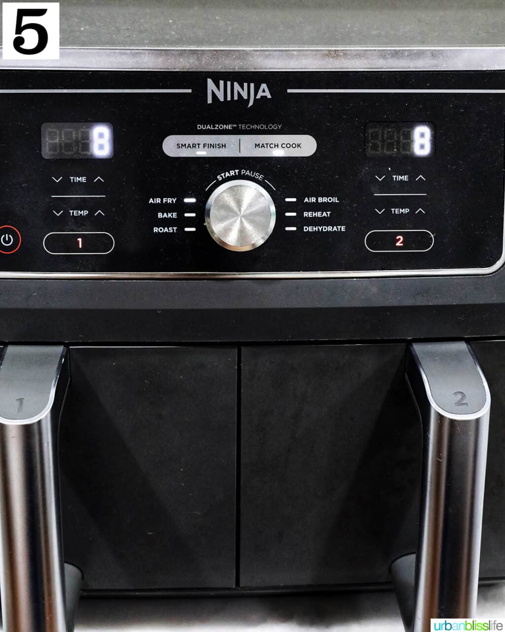 Ninja Dual Zone Air Fryer set to air fry at 8 minutes.