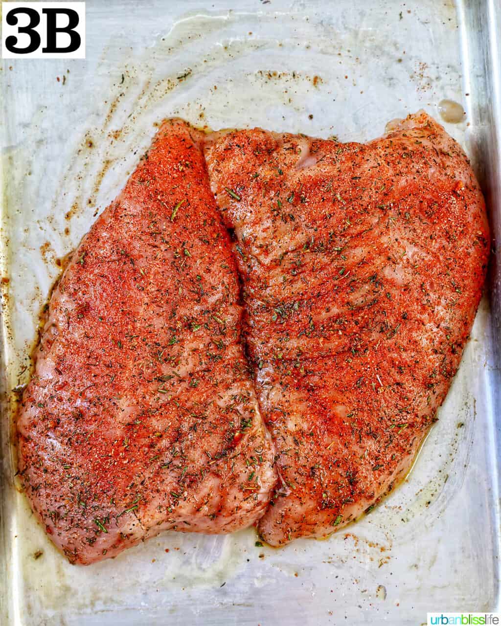 two turkey tenderloins seasoned.