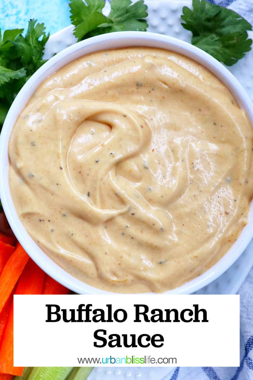 bowl of bowl of buffalo ranch sauce with a side of carrot sticks and more celery sticks with title text.