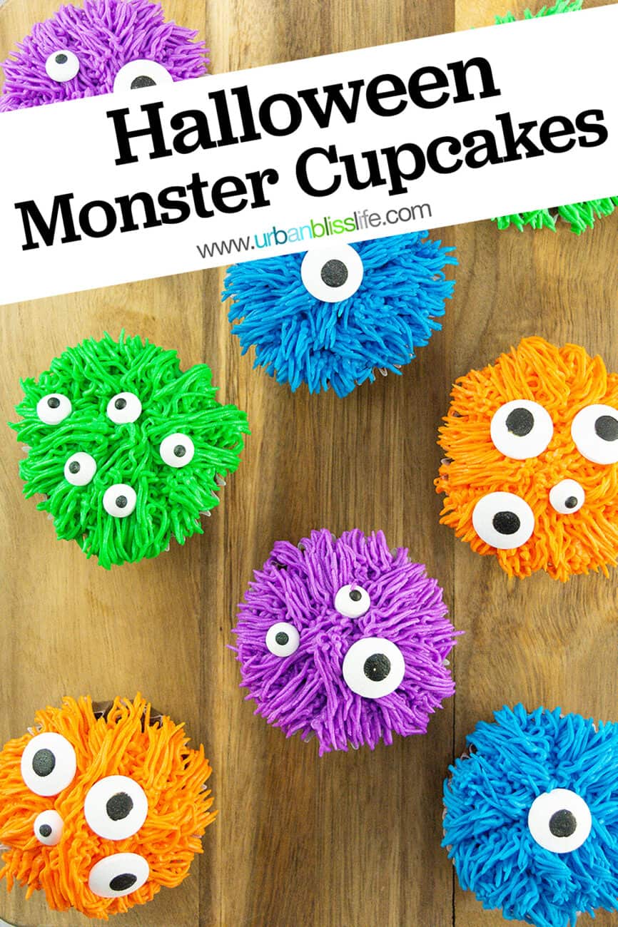 several colorful bright halloween monster cupcakes on a wood board with title text "Halloween Monster Cupcakes."