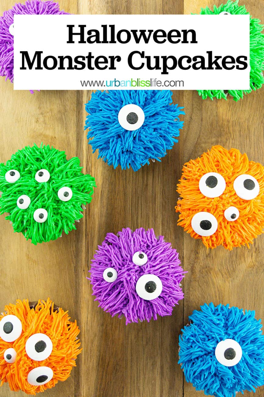 several colorful bright halloween monster cupcakes on a wood board with title text "Halloween Monster Cupcakes."