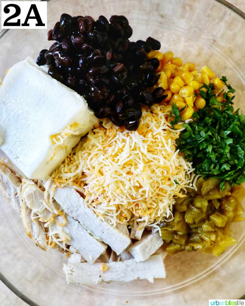 shredded cheese ,cream cheese, black beans, corn, and herbs to make enchiladas filling.
