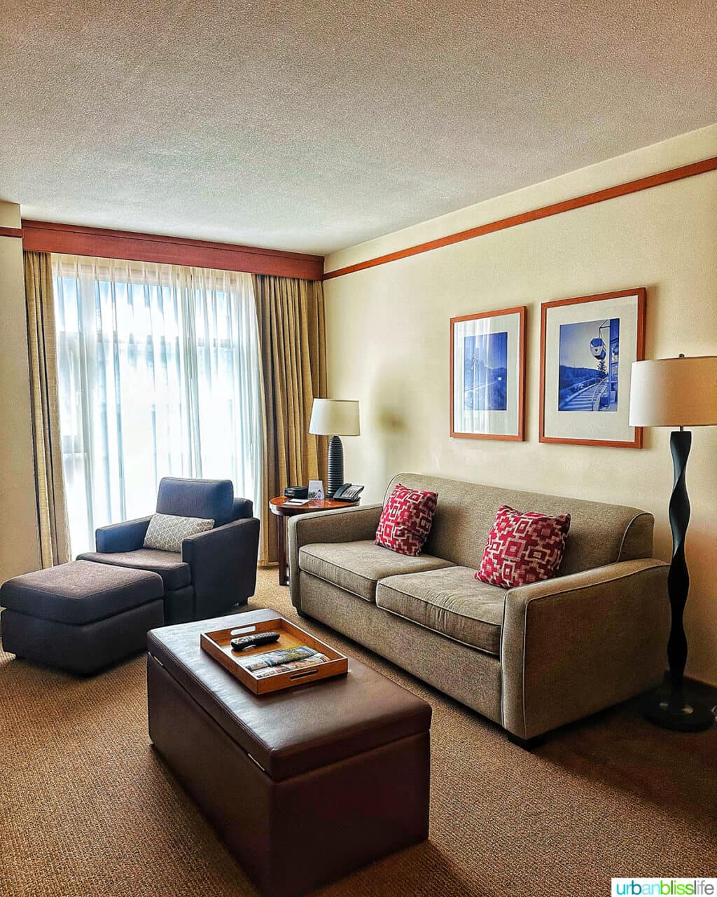 Living area of a one bedroom suite in the Pan Pacific Whistler Village hotel.