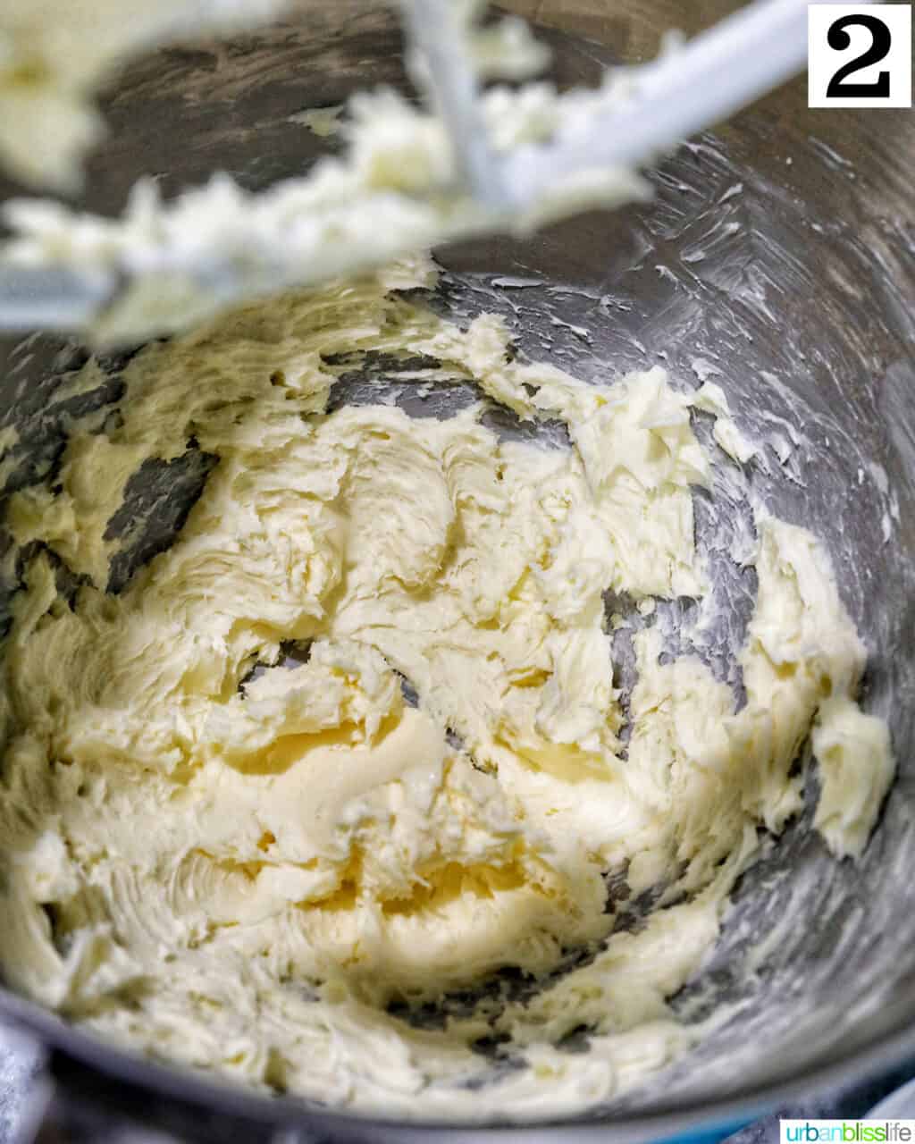 butter creamed in a stand mixer bowl.