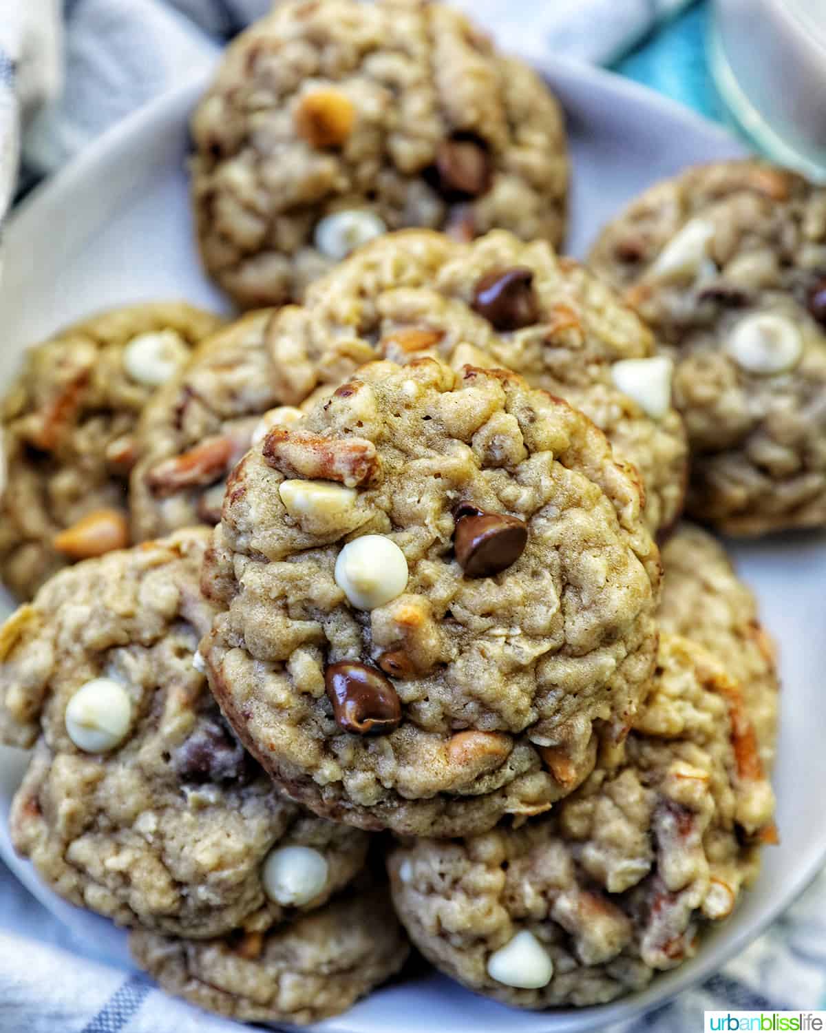 chocolate chip pretzel cookies stacked on a plate.