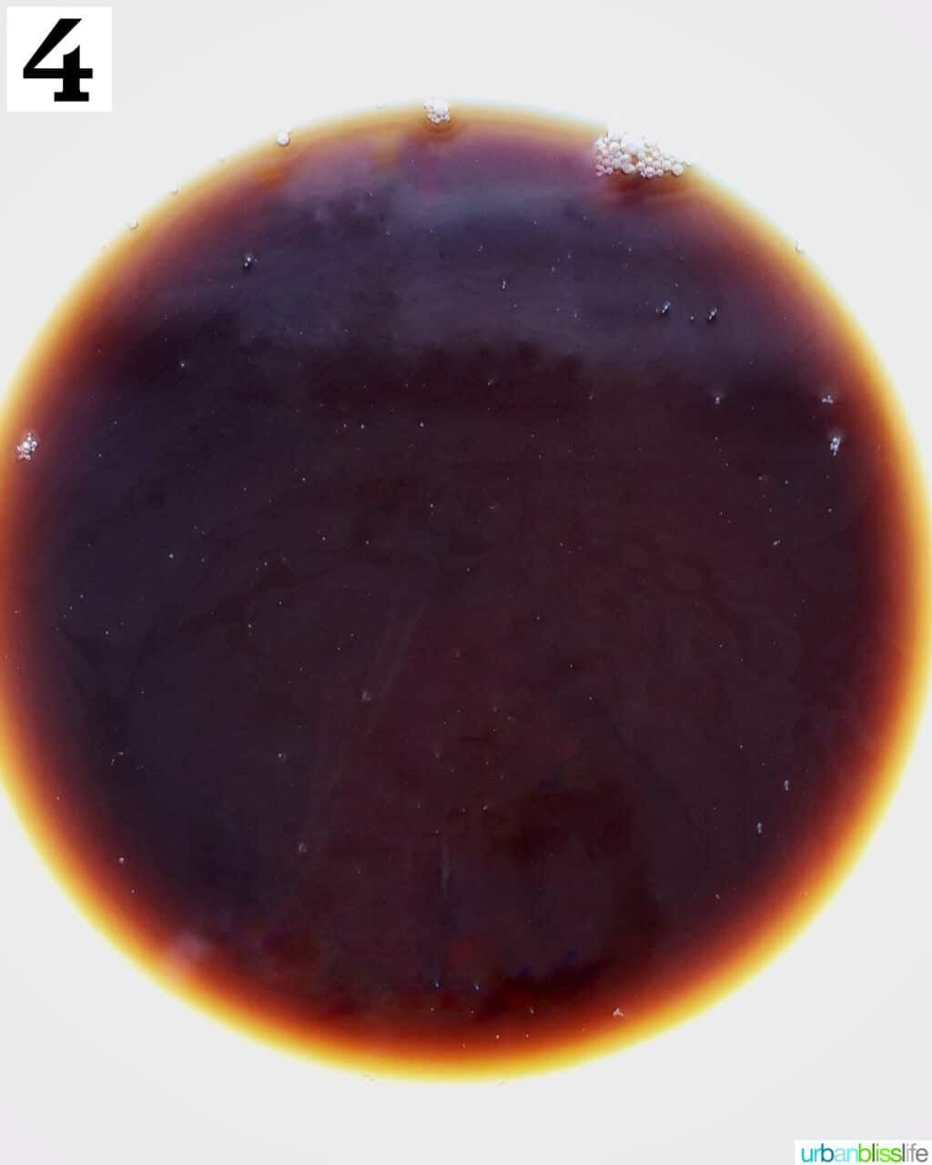 coffee marsala mixture in a clear glass bowl.