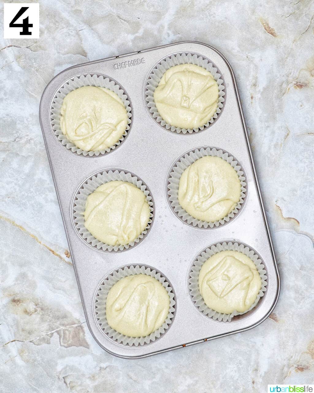 cupcake batter in cupcake tins.