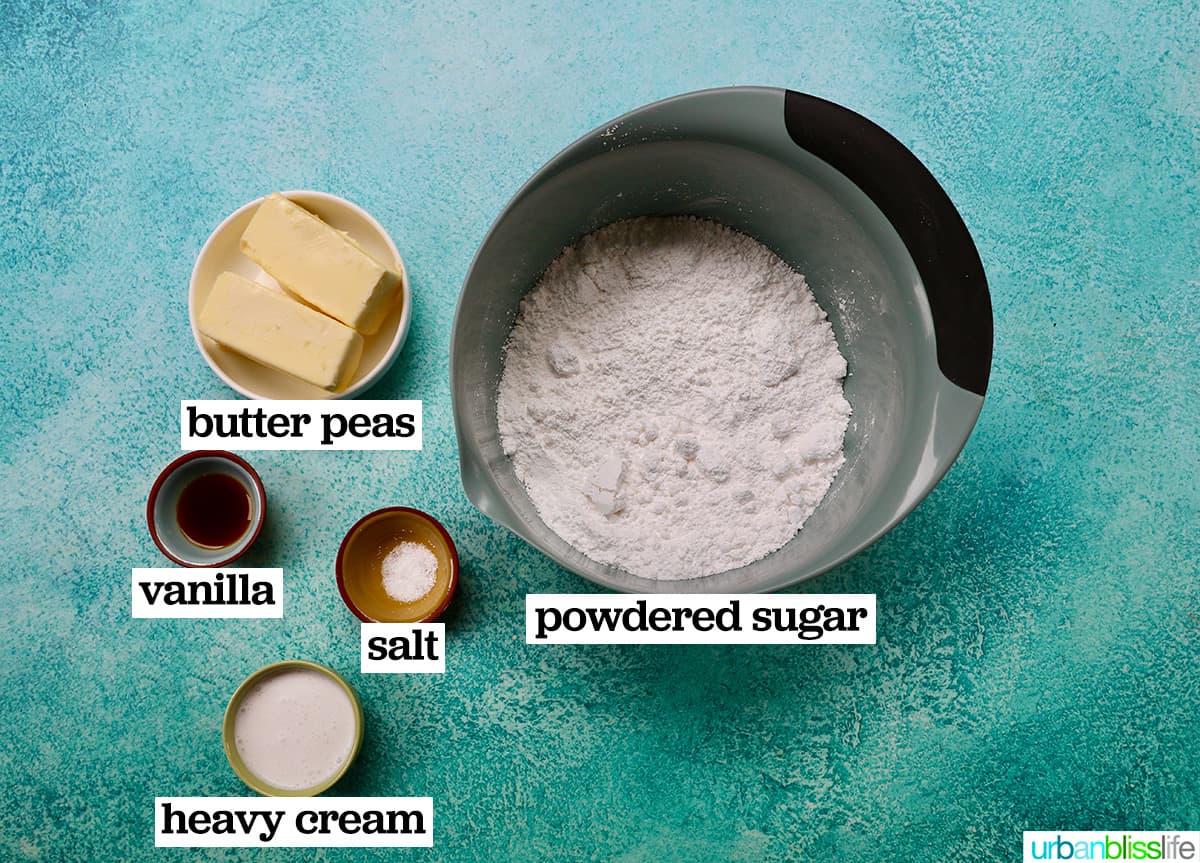 bowls of ingredients to make snowman cupcakes.