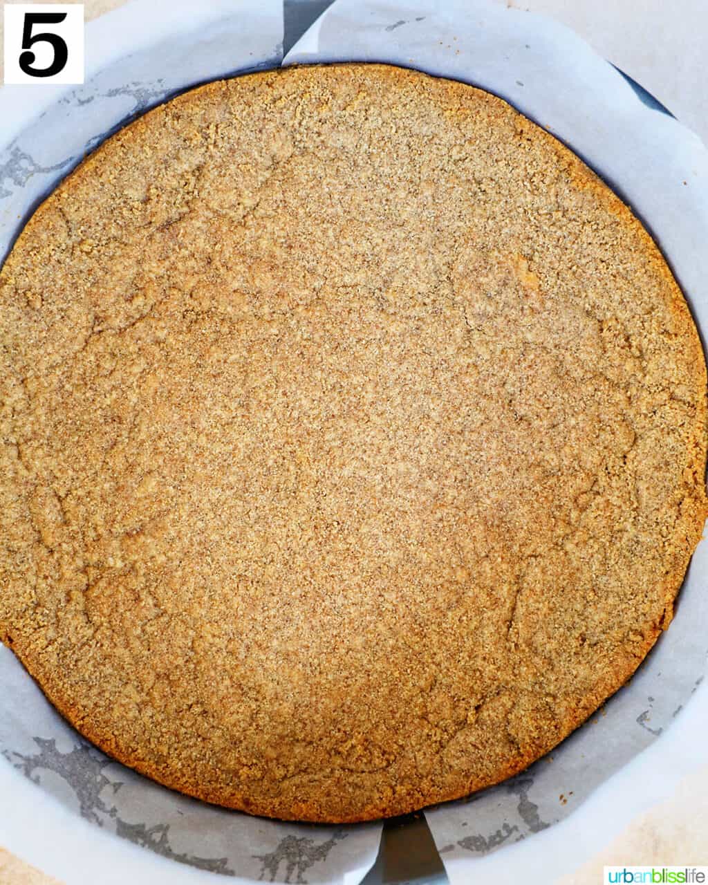 baked graham cracker crust in a springform pan.