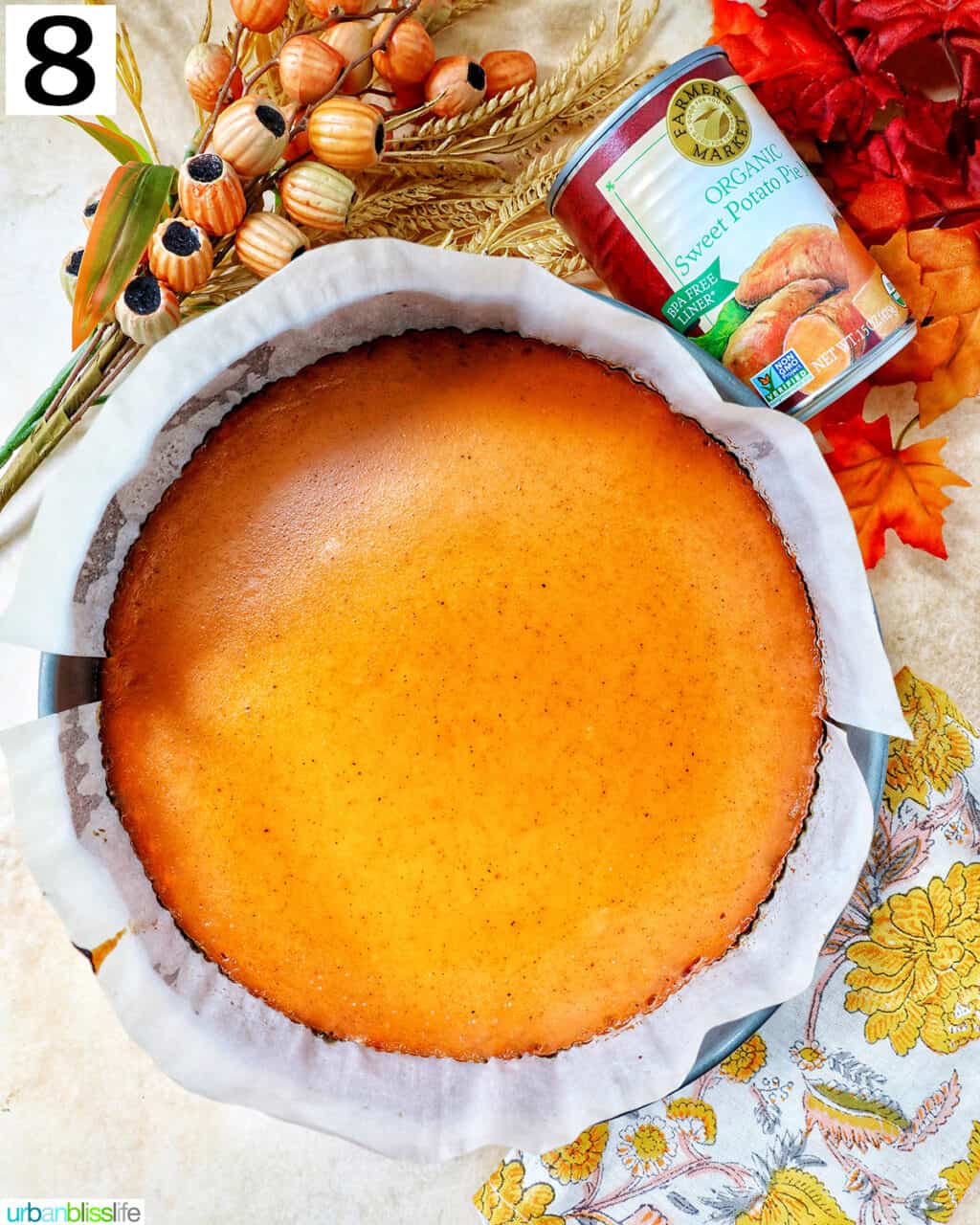 baked sweet potato pie in a pan with side of canned sweet potato pie mix.
