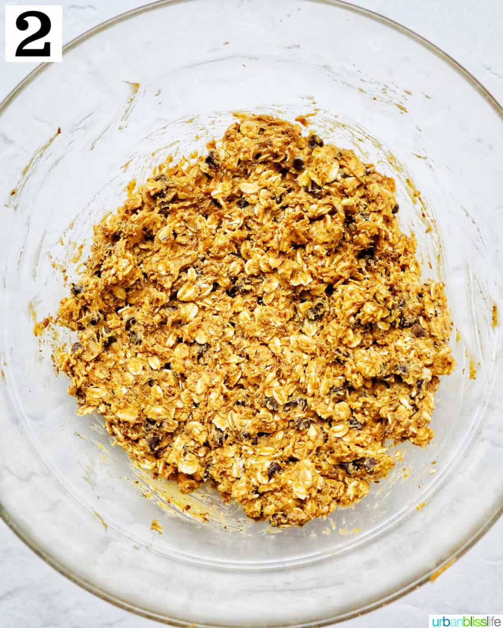 Peanut Butter Chocolate Chip Oatmeal Ball mix in a glass bowl.