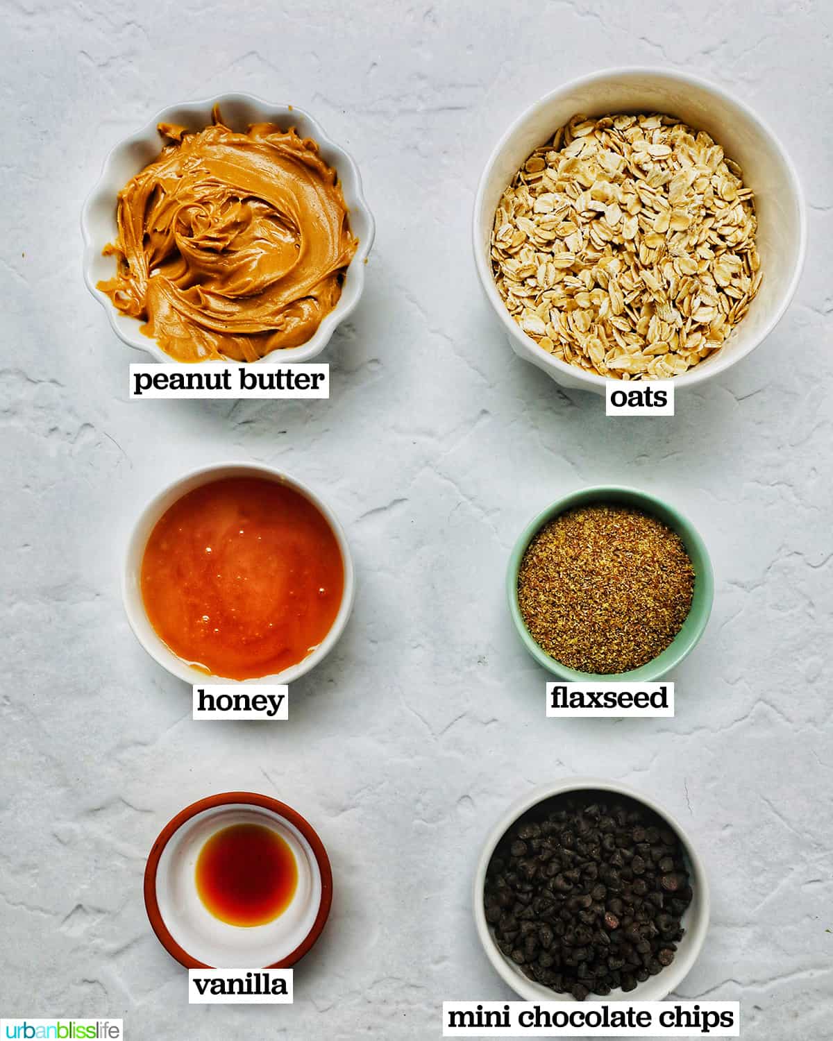 bowls of ingredients to make Peanut Butter Chocolate Chip Oatmeal Balls.